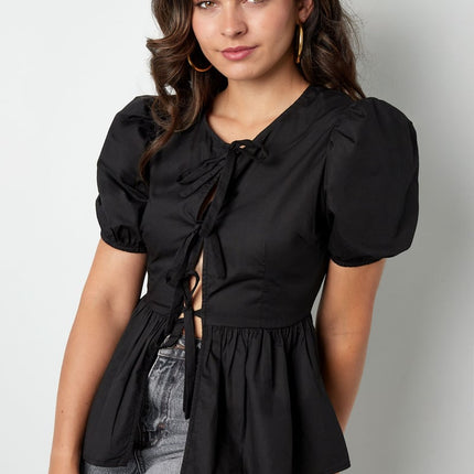 Blouse incontournable à basque et nœuds