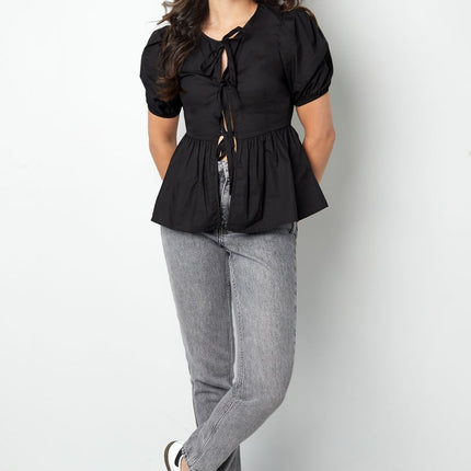 Blouse incontournable à basque et nœuds