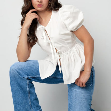 Blouse incontournable à basque et nœuds