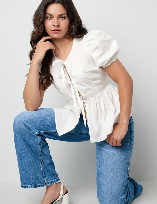 Blouse incontournable à basque et nœuds