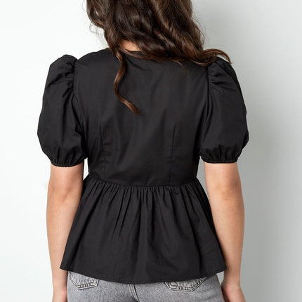 Blouse incontournable à basque et nœuds