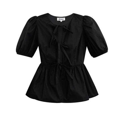 Blouse incontournable à basque et nœuds