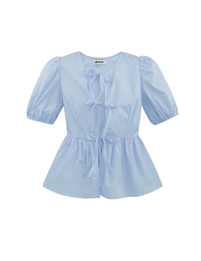 Blouse incontournable à basque et nœuds