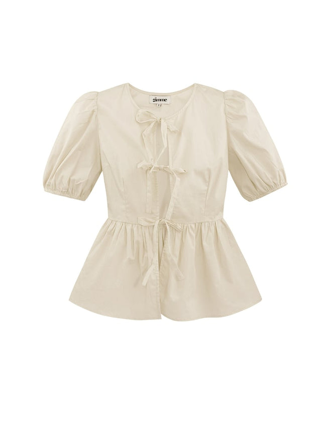 Blouse incontournable à basque et nœuds